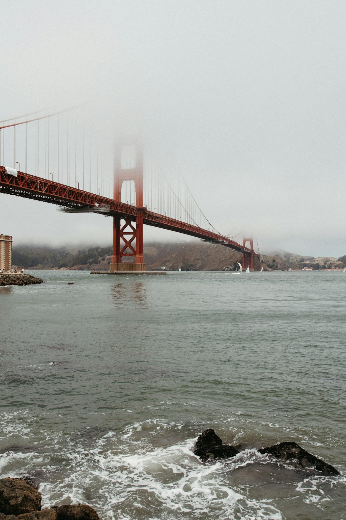 The Golden Gate Bridge disappearing into fog
