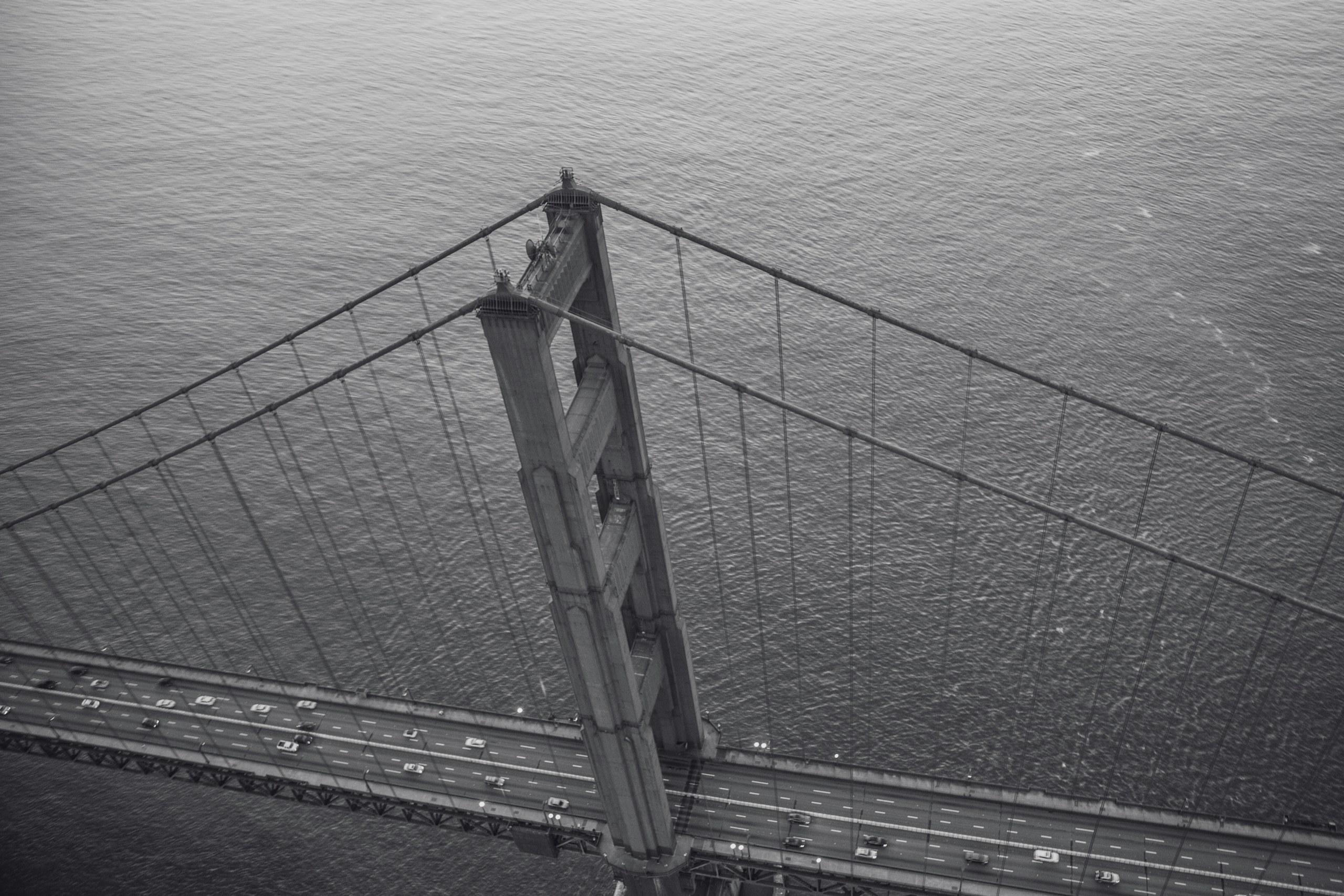 Aerial view of the Golden Gate Bridge stretching across the bay